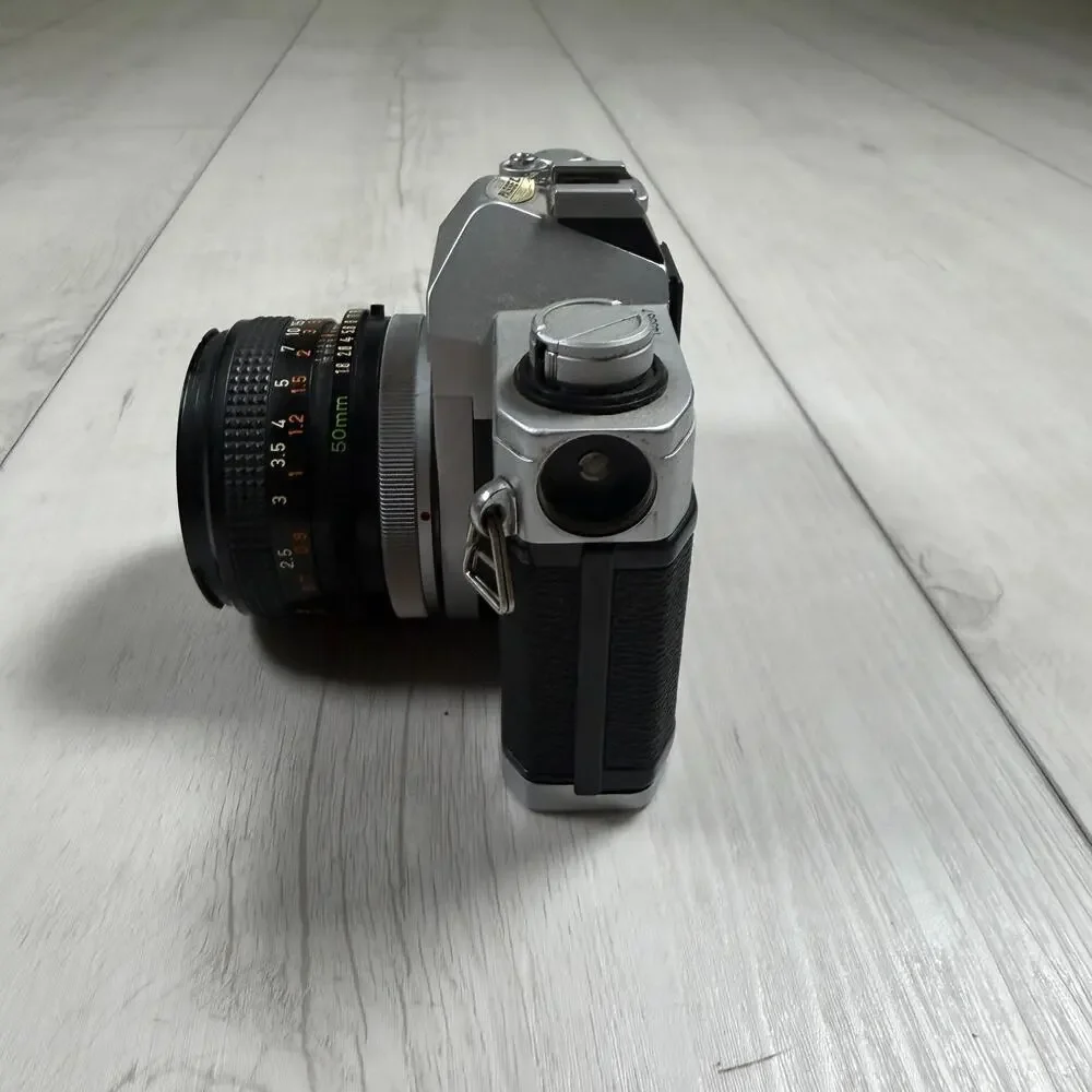 Canon TX 35mm SLR Film Camera with Canon FD 50mm f/1.8 Lens – Parts or Repair